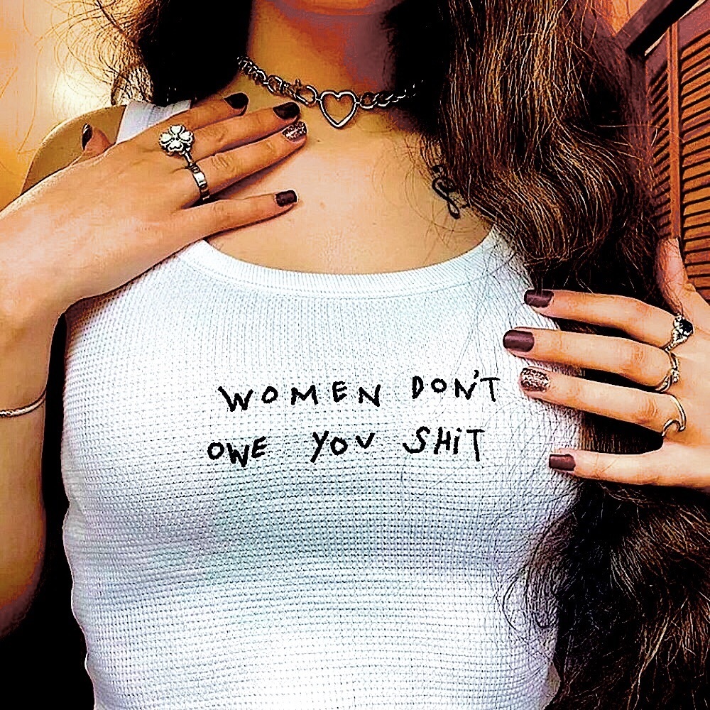 Women don’t owe you shit cropped tank top